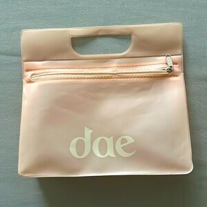 DAE travel bag, beautiful neutral pastel color, zip enclosure and top handle